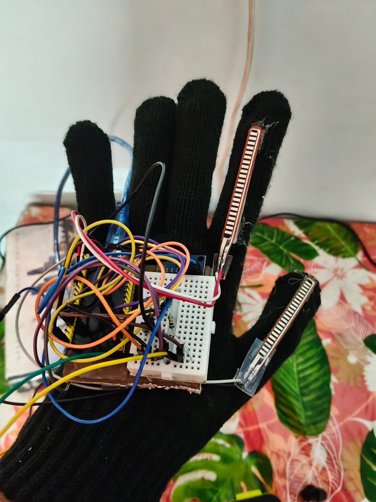 Wearable glove with sensors and haptic feedback